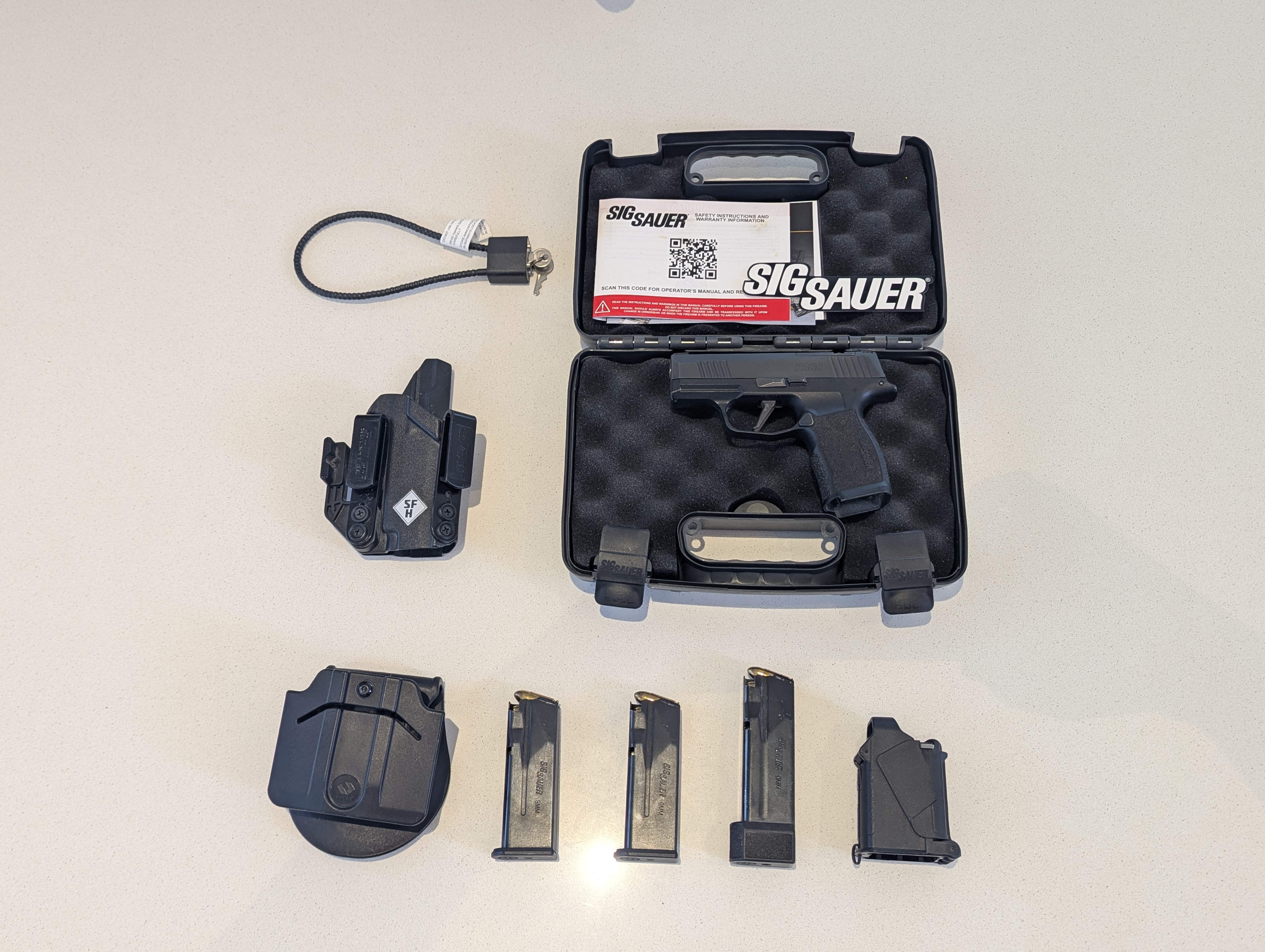Sig Sauer p365x עם 3 מחסניות וציוד נוסף 